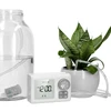 Automatisch bewateringssysteem voor potplanten ['automatische bewatering van planten', ' bewatering voor binnenplanten', ' automatische pomp voor bewatering', ' bewateringssysteem voor potten', ' bewatering van meerdere planten', ' automatisch watergeven', ' planten water geven tijdens vakantie', ' zelfregulerende bewatering van planten', ' plantaccessoires', ' optimale bewatering', ' makkelijk planten bewateren', ' automatische bewateraar voor kamerplanten', ' slim bewateren']