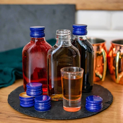 Fles voor likeuren heupfles 100 ml + dop 8 stuks - 3 ['flessen', ' heupflessen', ' likeuren', ' flessen voor likeuren', ' flesjes', ' huisgemaakte dranken', ' huisgemaakte likeuren', ' heupfles met dop', ' fles met dop', ' flesje met dop', ' flessen met gekleurde doppen', ' gekleurde doppen', ' doppen']