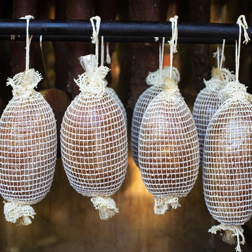 Vleeswaren net met afmetingen 15 cm x 50 m, met thermische weerstand tot 220°C - 12 ['net voor ham', ' voedingsnet', ' net voor vleeswaren', ' net voor het roken van vleeswaren', ' net voor gerijpte vleeswaren']